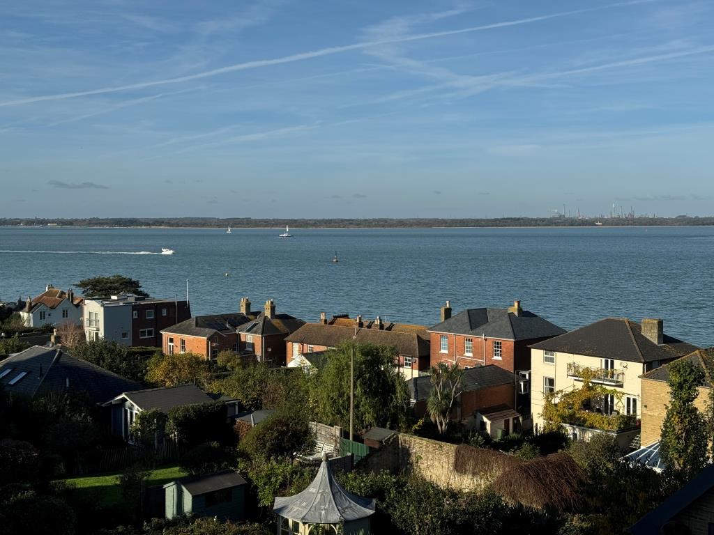 Lot: 28 - BLOCK OF THREE TWO-BEDROOM AND ONE THREE-BEDROOM FLATS WITH PARKING AND SEA VIEWS - Sea view from the building towards The Solent